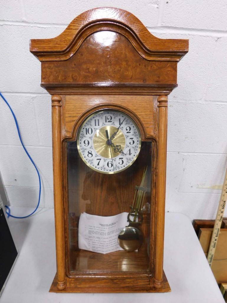 Oak Mantel Clock with Pendulum: Oak Mantel Clock with Pendulum . Includes instructions for setting up double chime movements. Condition: untested