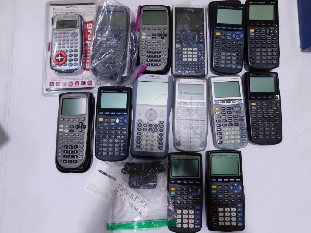 Lot of Calculators incl a New in Package Graphing Calculator (1 of 3)
