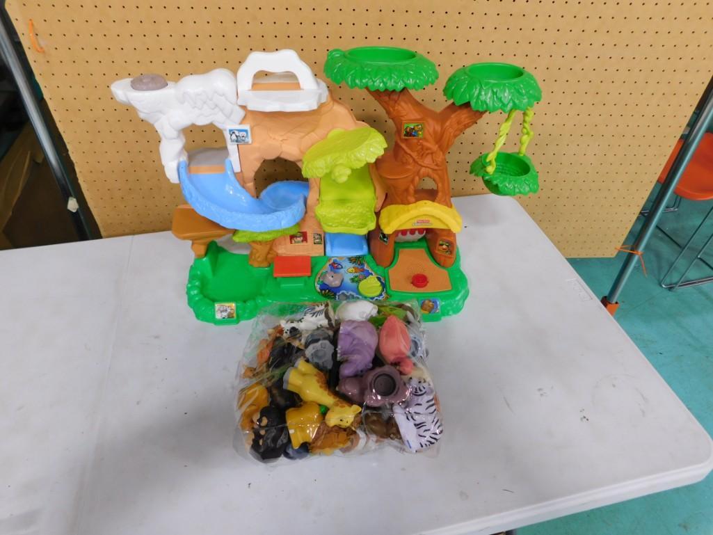 Fisher Price Little People Zoo Talkers Playset with 45 Animals: Includes tree house zoo and 45 animals. Works! Includes extra Fisher Price animals from different sets.
