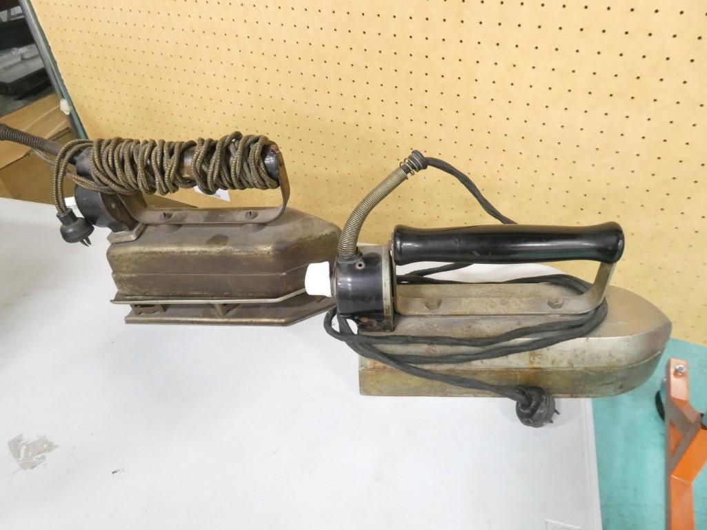 2 Large Vintage or Antique Irons incl Hotpoint with a Stand: 2 Large Vintage or Antique Irons incl Hotpoint with a Stand. Both are electric. Condition: untested