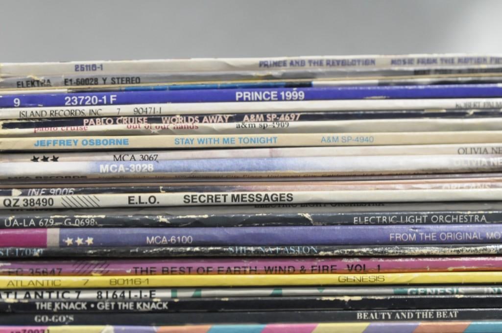 Large Lot of Vinyl Records including Prince, Bablo Cruise, ELO, The Knack, Go-Go's, (1 of 2)