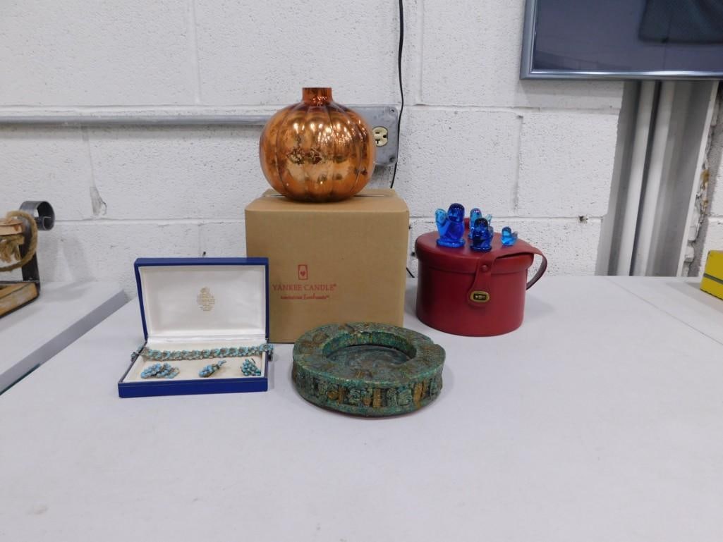 Collectibles incl Vintage Ashtray with Aztec or Mayan Design, Glass Bluebirds, Costume Jewelry, Yank: Collectibles incl Vintage Ashtray with Aztec or Mayan Design, Glass Bluebirds, Costume Jewelry, Yankee Candle Holder Condition: Jewelry is missing some blue parts and includes a bracelet, 1 earring, 2