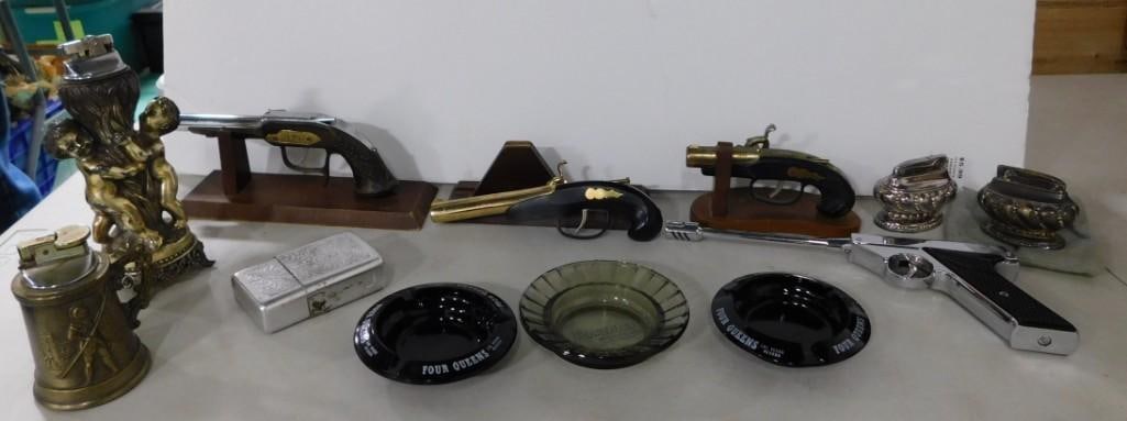 Lighter and Ashtray lot including many novelty gun lighters, Las Vegas ashtrays, etc.: Lighter and Ashtray lot including many novelty gun lighters, Las Vegas ashtrays, Cherub Brass Lighter, etc.