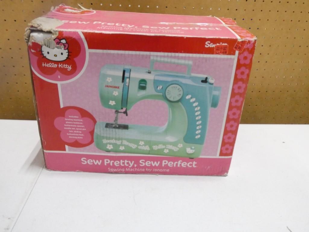 Hello Kitty Sew Pretty Sew Perfect Toy Sewing Machine: Hello Kitty Sew Pretty Sew Perfect Toy Sewing Machine Condition: untested, in original box but box has damage