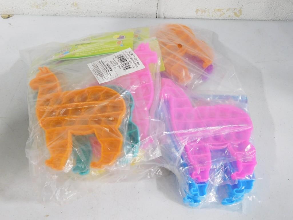 Lot of 12 new in package Llama shaped bubble poppers toys: Lot of 12 new in package Llama shaped bubble poppers toys - these are like repoppable bubble wrap!
