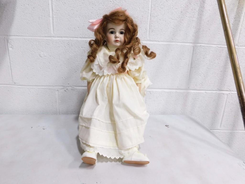 Simon & Halbig Reproduction Doll: Simon & Halbig Reproduction Doll. Has the Simon & Halbig mark on the back of her neck. Back of the head has a hairline crack.