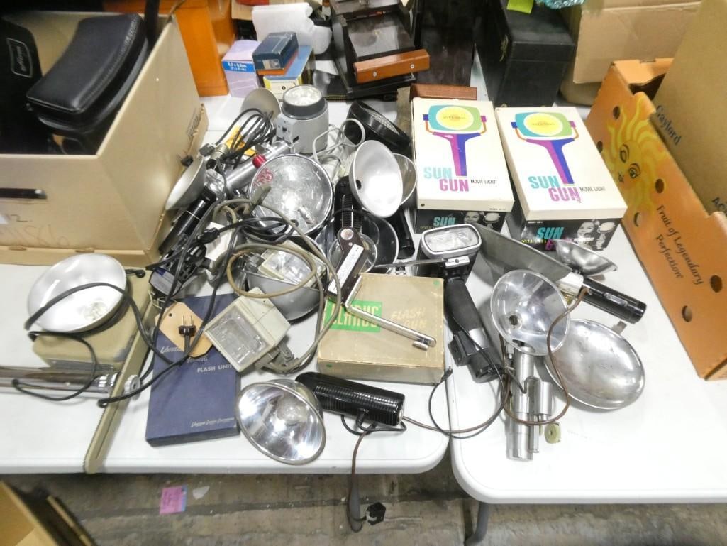 Lot of Flash Bulb Holders and Movie Lights: Lot of Flash Bulb Holders and Movie Lights