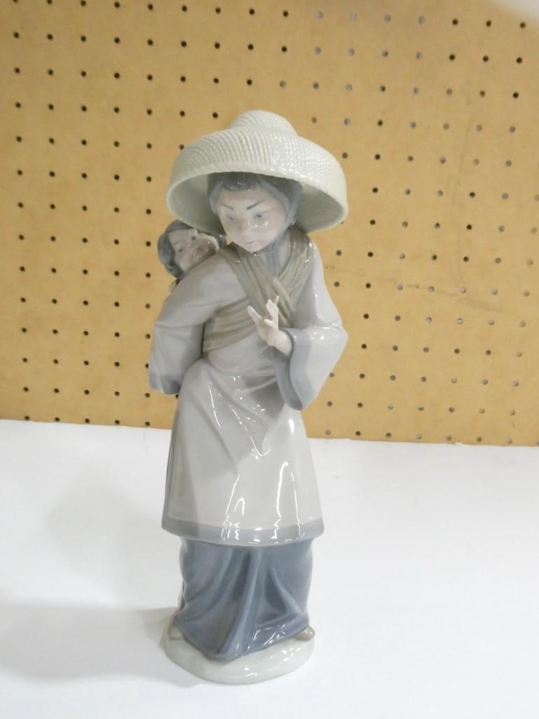 Retired Lladro Figurine - Chinese with baby on her: Retired Lladro Figurine - Chinese with baby on her