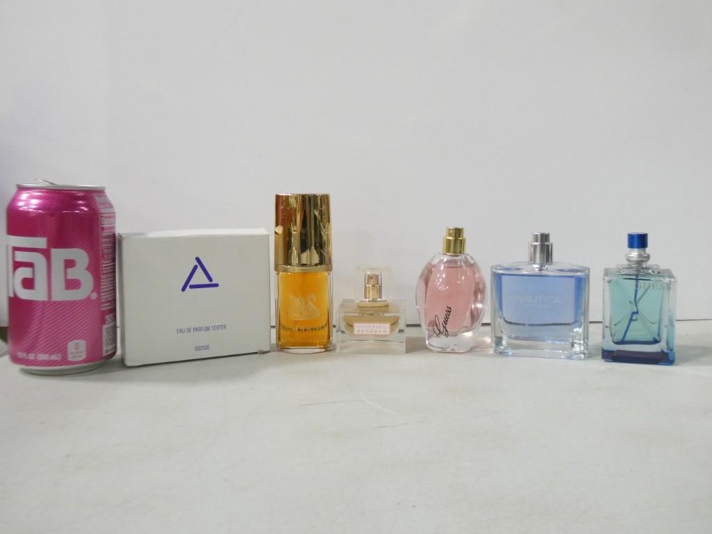 Lot of Perfume and Cologne Bottles incl Guess, Nautica, Beckham Intimately, Vanderbilt, etc: Lot of Perfume and Cologne Bottles incl Guess, Nautica, Beckham Intimately, Vanderbilt, etc NOTE: these are being sold as empty, collectible bottles with no guarantees as to the quality or quantity of
