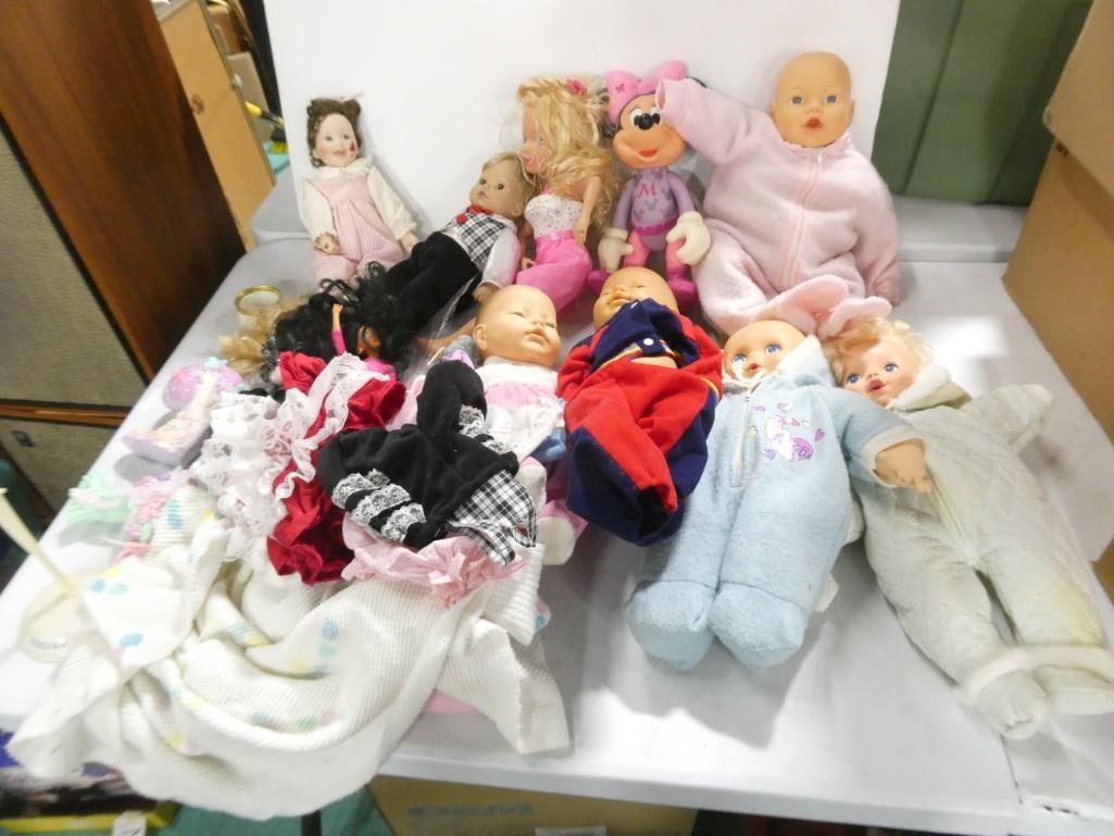 Lot of Dolls incl Baby Dolls, Accessories, Barbie, Minnie Mouse, Kewpie Babies, Etc: Lot of Dolls incl Baby Dolls, Accessories, Barbie, Minnie Mouse, Kewpie Babies, Etc. Played with condition.