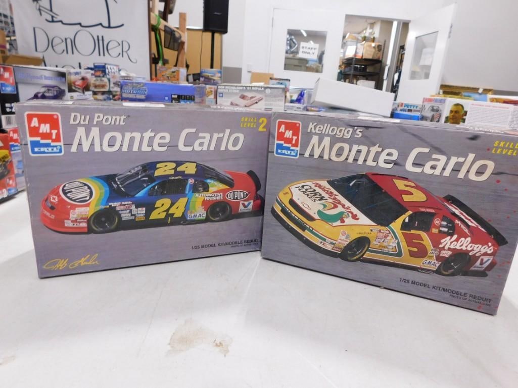 2 AMT Ertl Model Car Kits incl Kellogg's Monte Carlo and Du Pont Monte Carlo: 2 AMT Ertl Model Car Kits incl Kellogg's Monte Carlo and Du Pont Monte Carlo . Both are 1/25 Scale and are in open boxes. Includes everything that you see in the pictures