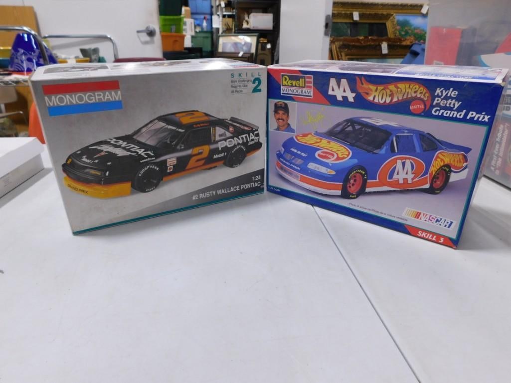 2 Model Car Kits incl Revell Monogram 44 Hot Wheels Kyle Petty Grand Prix and Monogram Rusty Wallace: 2 Model Car Kits incl Revell Monogram 44 Hot Wheels Kyle Petty Grand Prix and Monogram Rusty Wallace Pontiac . Both are 1:24 Scale and in open boxes. Includes everything that you see in the pictures