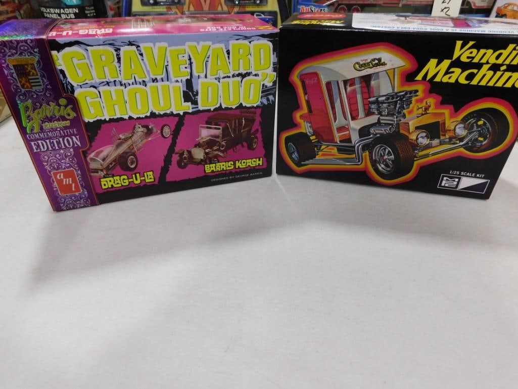 2 Model Car Kits incl MPC Coca Cola Vending Machine and AMT Graveyard Ghoul Duo: 2 Model Car Kits incl MPC Coca Cola Vending Machine and AMT Graveyard Ghoul Duo . Both in open boxes. Includes everything that you see in the pictures