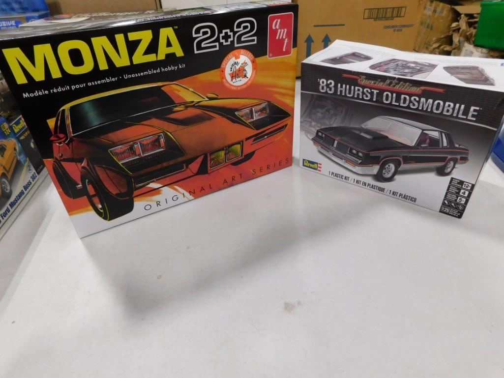 2 Model Car Kits incl AMT Monza 2+2 and Revell '83 Hurst Oldsmobile Special Edition: 2 Model Car Kits incl AMT Monza 2+2 and Revell '83 Hurst Oldsmobile Special Edition. Both are in open boxes and include everything that you see in the pictures