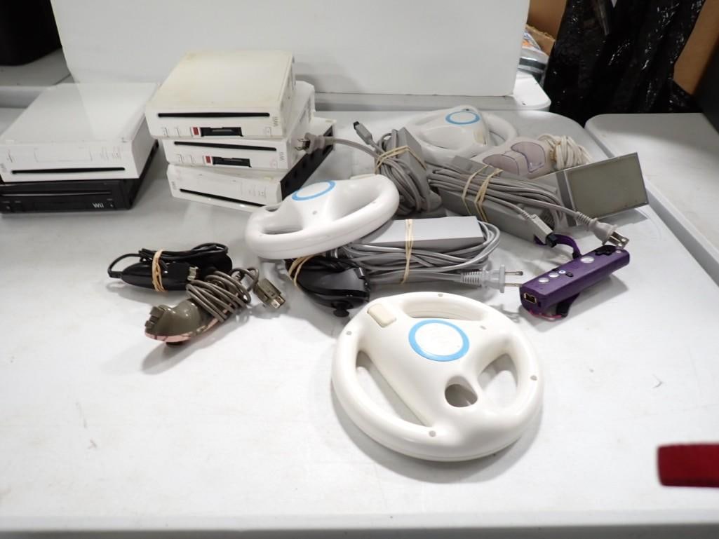 Lot of 5 Nintendo Wii's with some accessories: Lot of 5 Nintendo Wii's with some accessories - all items are as is and untested.