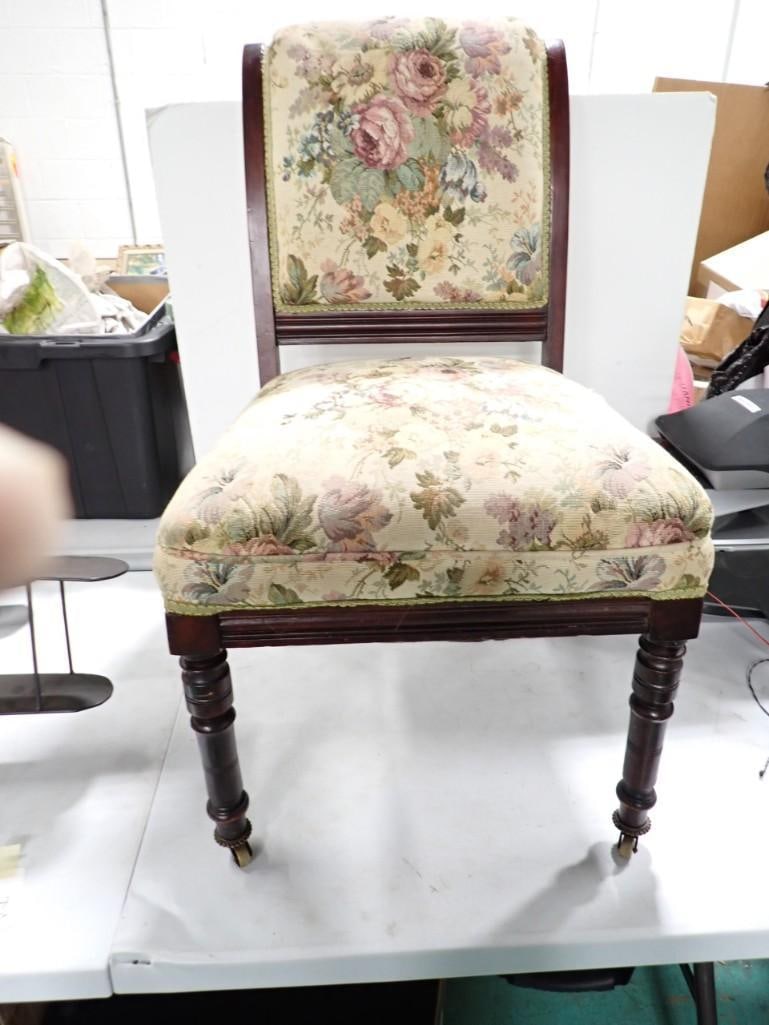 Vintage or antique dining room chair with front wheels: Vintage or antique dining room chair with front wheels