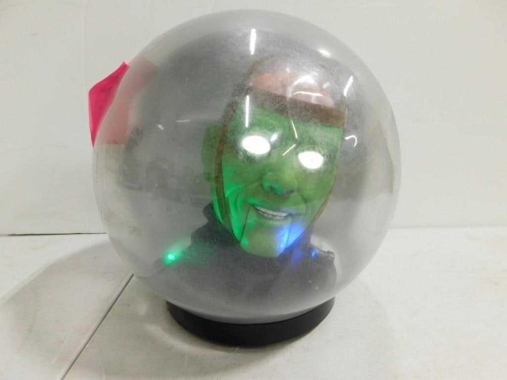 Animated Fortune Teller Globe: Animated Fortune Teller Globe . Works, has damage to the back including a hole, dents, and scratches