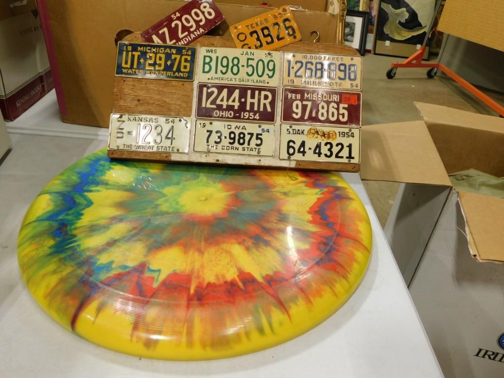 Large Psychedelic Frisbee and some 1950's small embossed license plates (1 of 4)
