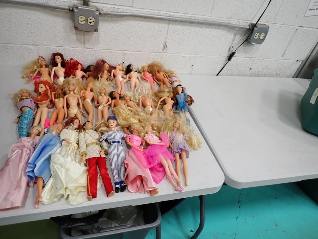 30 Barbie Dolls and Other Fashion Dolls: Lot of 30 Barbie Dolls and Other Fashion Dolls . These are in played with condition and come as you see them with everything shown in the pictures