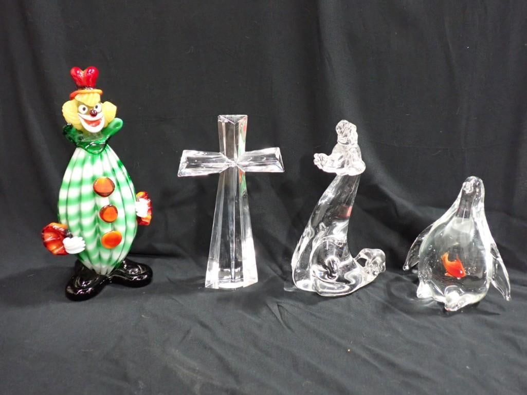 4 Art Glass Figures or Paperweights incl Penguin, Clown, Poodle, Cross: Lot of 4 art glass figures or paperweights including a 9" clown, 5" penguin with fish inside, 7" crystal poodle figure, and a 7" crystal cross