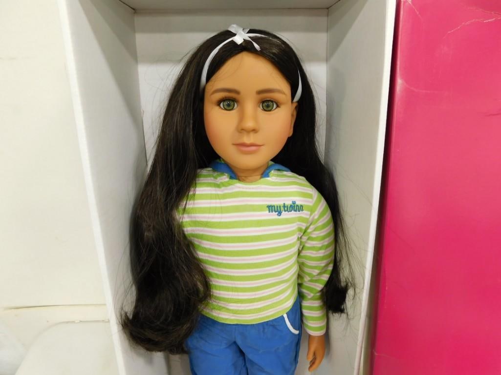 My Twinn Audrey 23" Ethnic Custom Doll w/ Box: My Twinn Audrey 23" Ethnic Custom Doll with Box. She is 23" tall, hazel eyes, long brunette hair, medium skin tone, in Mt outfit and camisole set. head marked, "1997 My Twinn". My Twin