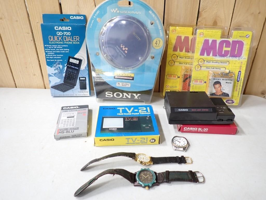 Electronics Lot including NOS Sony Walkman CD Player, Digital Phone book, Calculator, TV, Watches, (1 of 6)