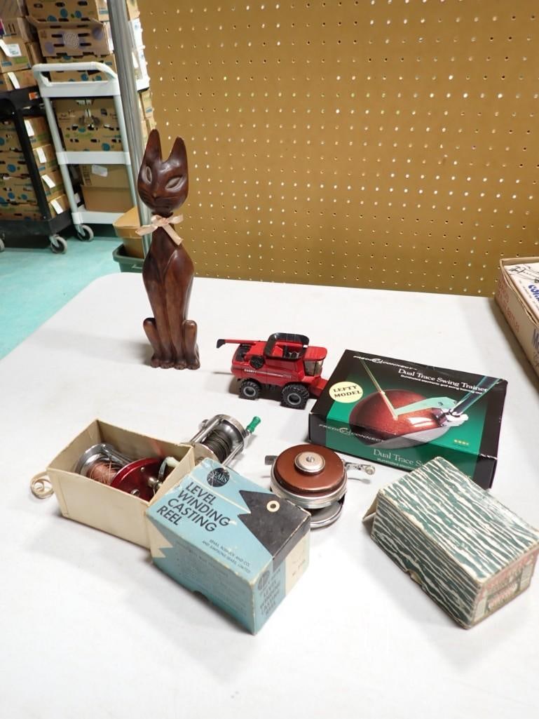 Lot of Smalls incl Wooden Cat, Cast Iron Toy Tractor, Golf Swing Trainer, 3 Fishing Reels (1 of 6)