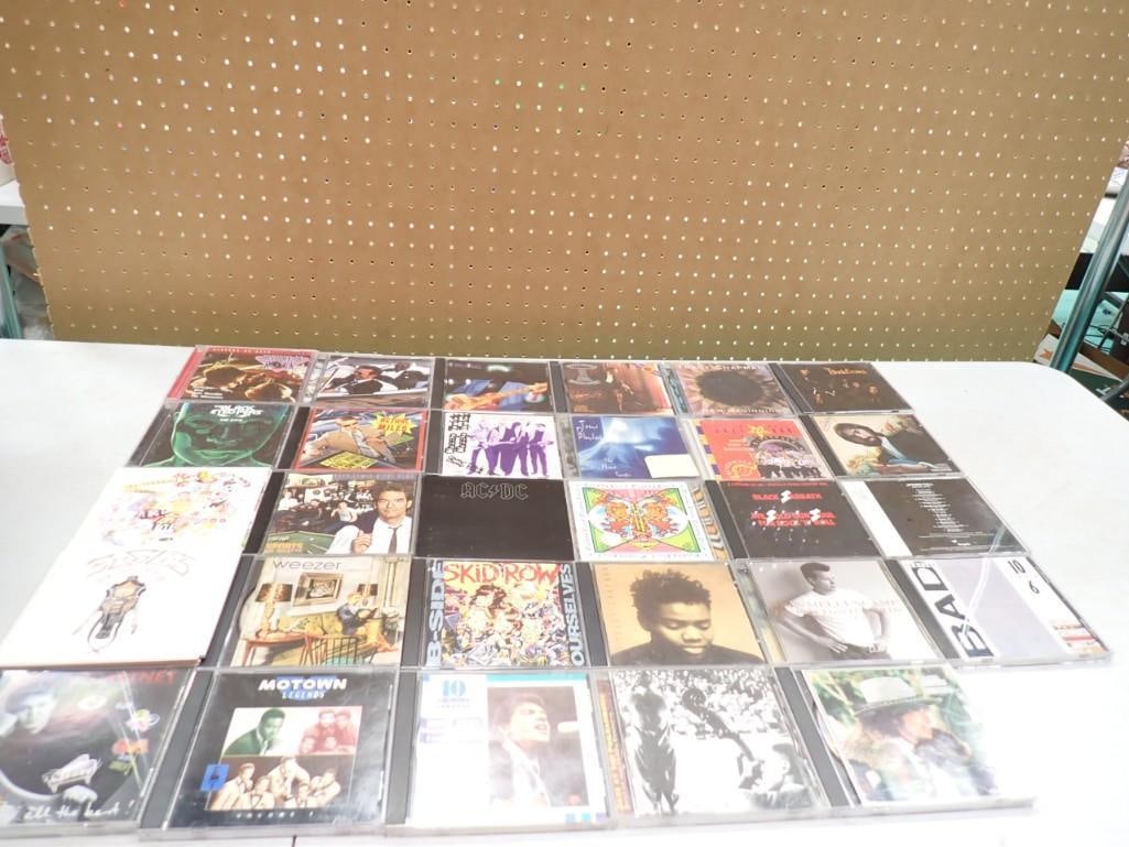 Music CD lot including Weezer, AC/DC, Tracy Chapman, Black Sabbath, Motown, Cheap Trick, Black Crows (1 of 6)