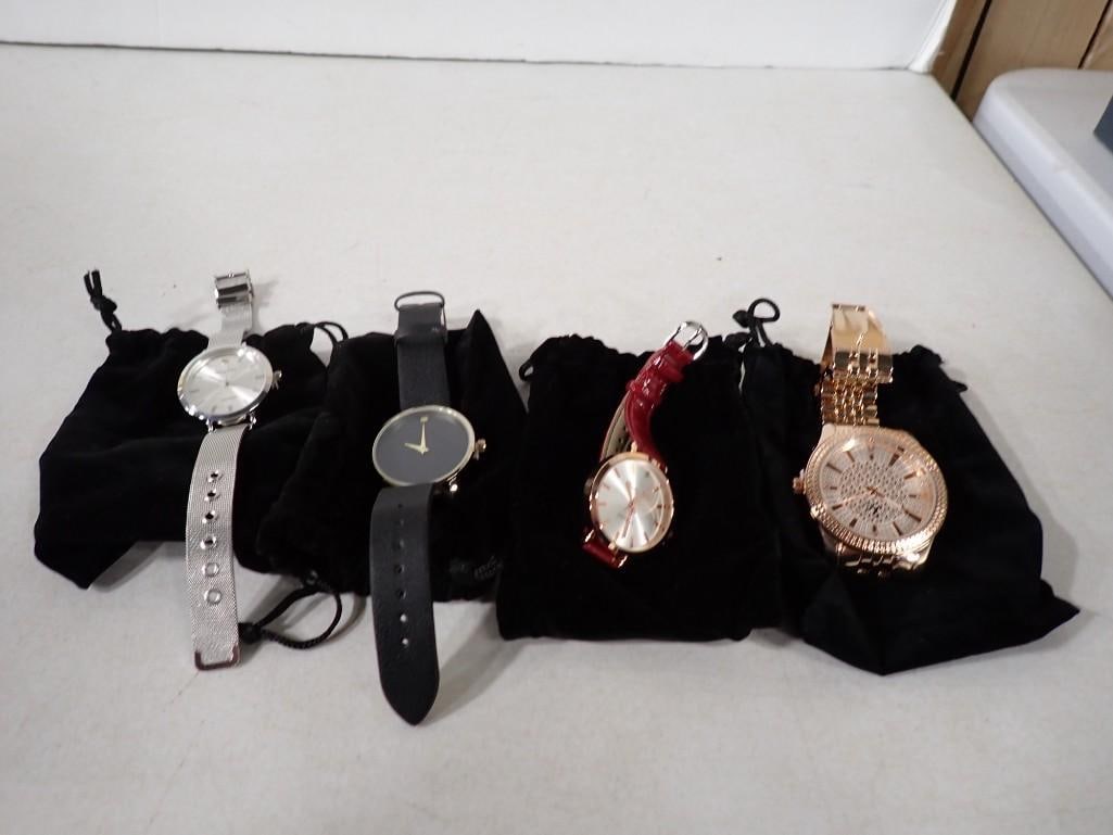 4 Watches with Drawstring Pouches (1 of 3)
