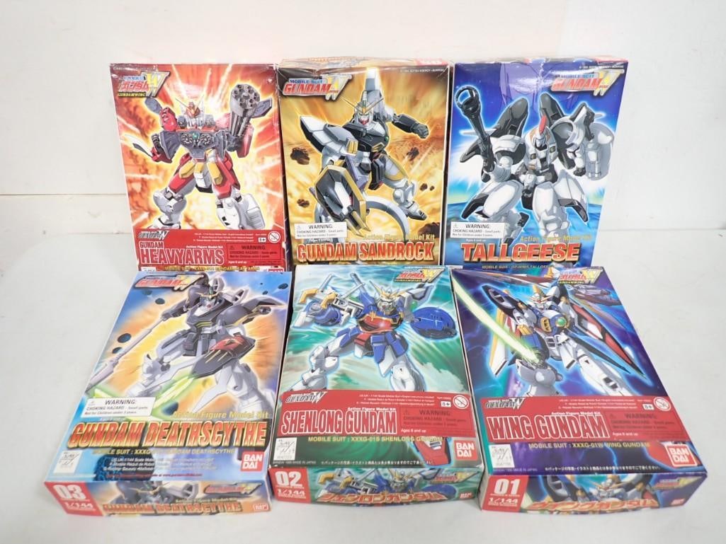6 Vtg 1995 Gundam Bandai japan Action Figure Model Kits: 6 Vintage 1/144 scale COMPLETED action figure model kits with boxes. Tallgeese, Sandrock, Deathscythe, Heavy Arms, Shenlong, Wing Gundam. Includes items shown. Bandai Japan 1995