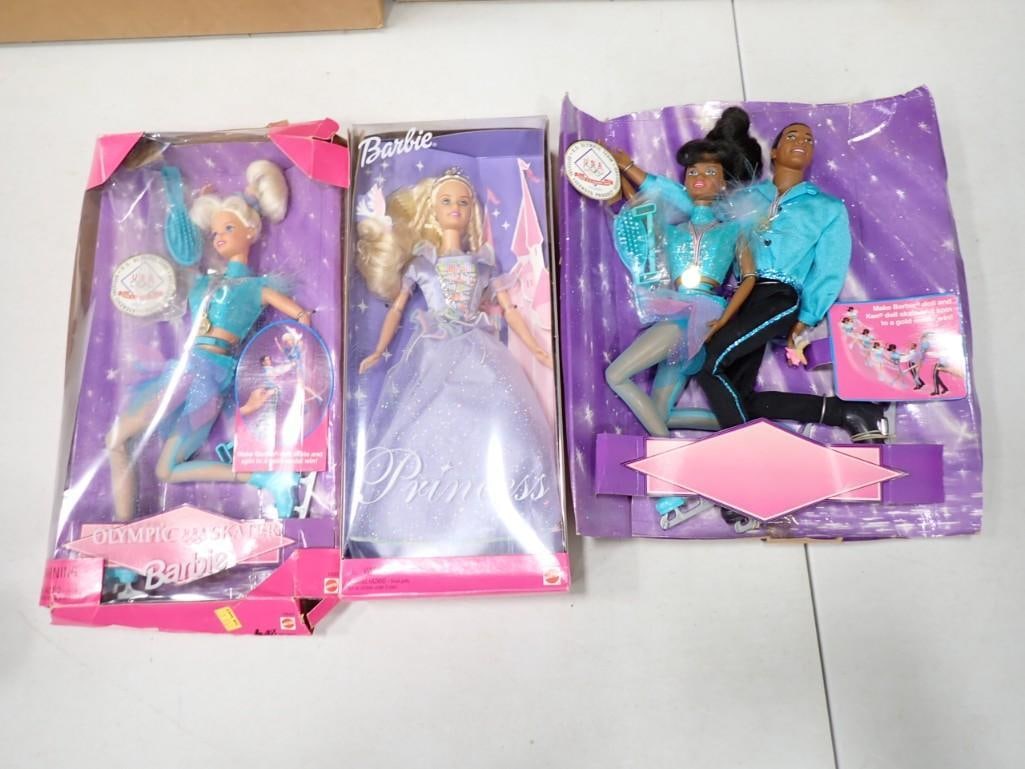3 Barbies incl Olympic USA Skater Barbie, Princess Barbie, 1997 Barbie & Ken USA Skater: 3 Barbies incl Olympic USA Skater Barbie, Princess Barbie, 1997 Barbie & Ken USA Skater. Condition: boxes are damaged. 1997 Barbie and Ken are on the cardboard backing only (no box).
