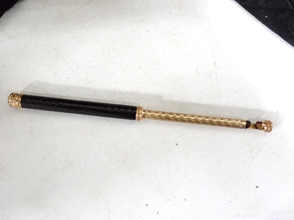 An Ebony and Gold Filled Telescoping Opera Glass Holder in the style of Jules King: An Ebony and Gold Filled Telescoping Opera Glass Holder in the style of Jules King