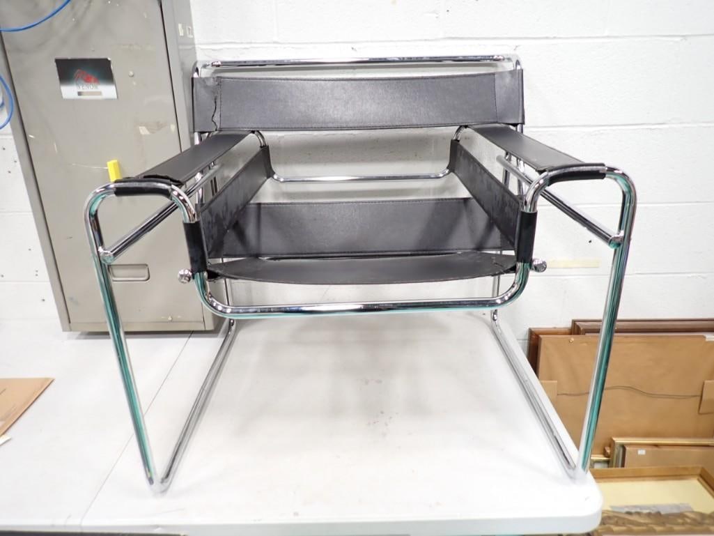 Marcel Breuer Wassily Style Black Leather Lounge Chair with Chrome: Marcel Breuer Wassily Style Black Leather Lounge Chair with Chrome - Measures roughly 31" wide x 29" tall x 28" deep. See all pictures, some cracks in the leather, but it can support a per