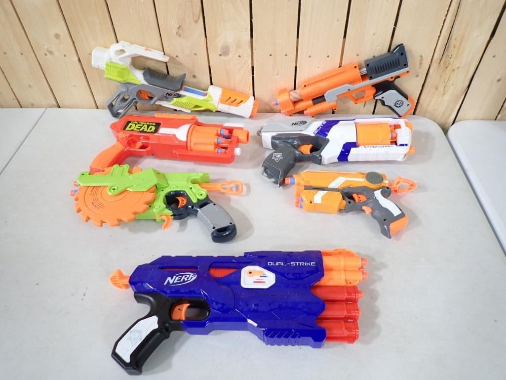 Toy gun lot including Nerf, Walking Dead, Dual-Strike, etc.: Toy gun lot including Nerf, Walking Dead, Dual-Strike, etc.