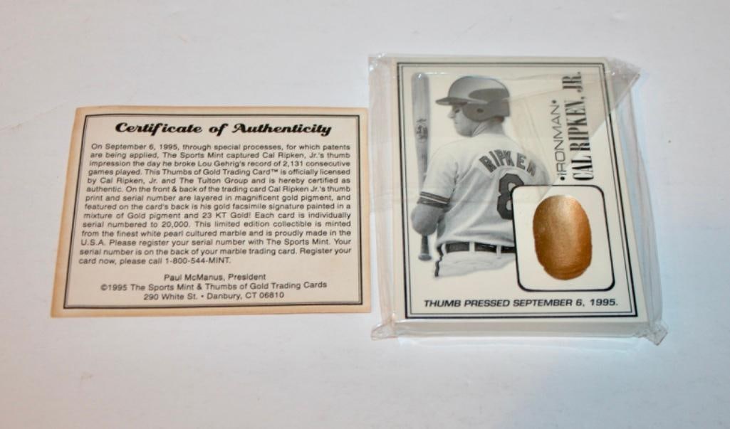 1995 Cal Ripken Jr. Thumbs Of Gold Card - LE 7005/20,000: 1995 Cal Ripken Jr. Thumbs Of Gold Card - LE 7005/20,000 One of the more unusual Ripken cards. The thumb impression was made September 6, 1995, and this card comes with the original COA.