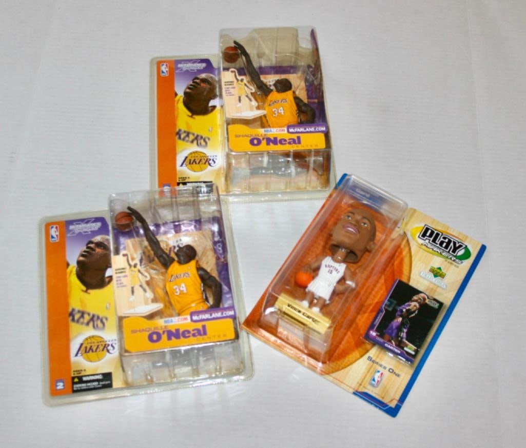2 Shaquille O'Neal McFarlane Figures And Vince Carter Play Maker Bobblehead - All NIP: 2 Shaquille O'Neal McFarlane Figures And Vince Carter Play Maker Bobblehead All three are still in their original and unopened packages.