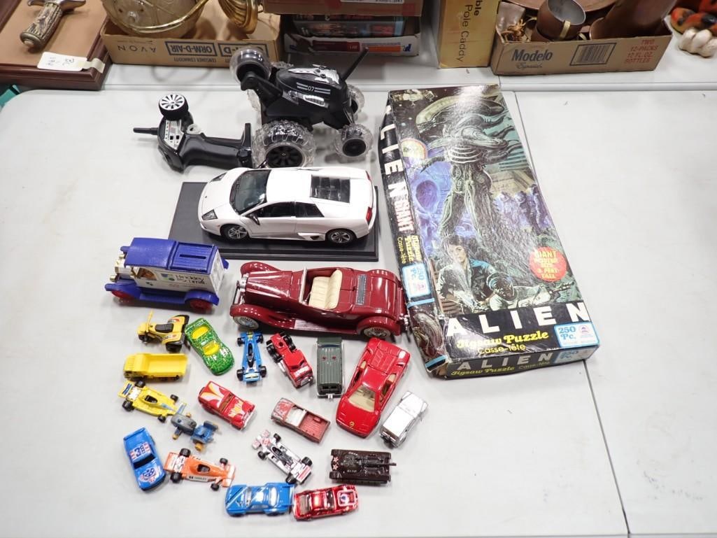 Toy Lot including assorted cars, Alien Jigsaw Puzzle, Thunder Tumbler RC, etc. (1 of 4)