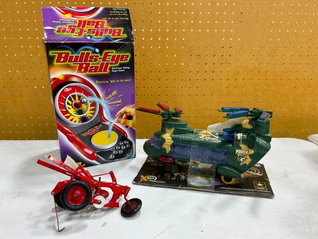 Toy Lot including Bulls Eye Ball, 1960's I. H. Plow Steel Original, 1980's Wonky Bump / Run Toy Heli (1 of 6)
