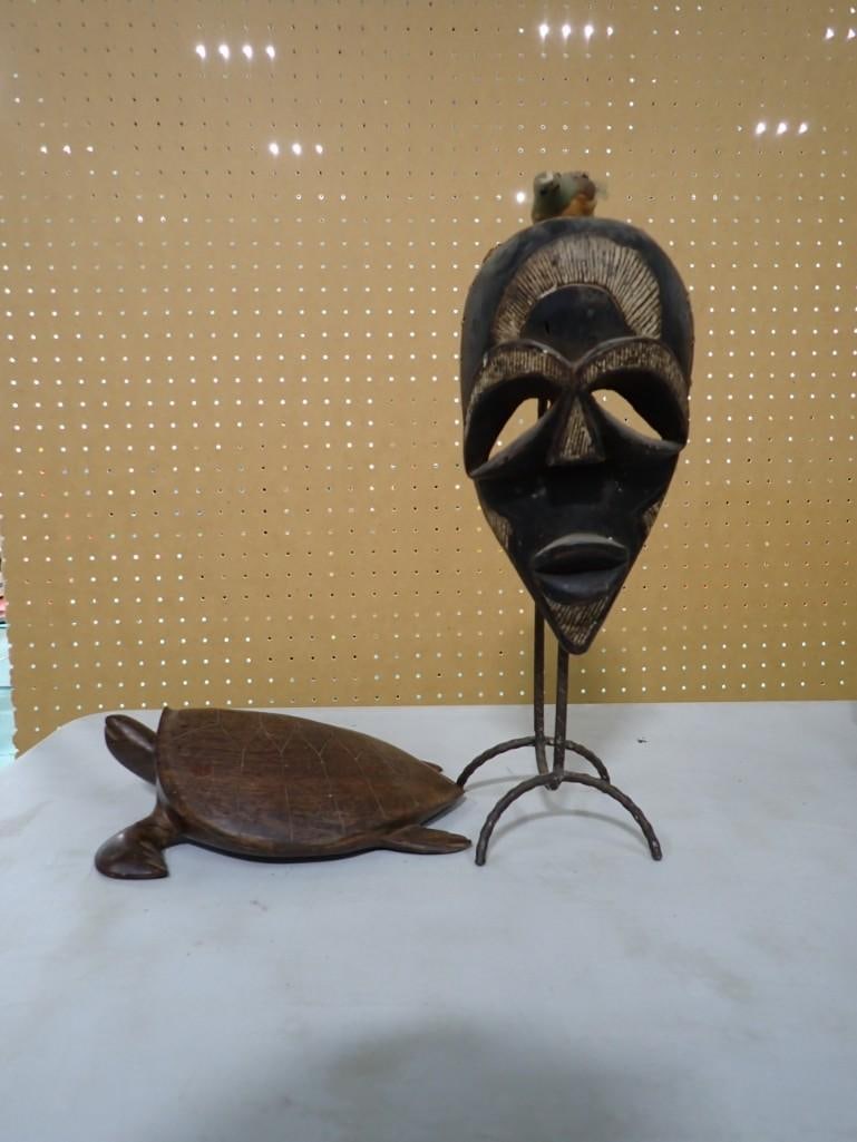 Wooden Tribal Mask and a Wooden Turtle: Wooden Tribal Mask and a Wooden Turtle - one of the turtle's flippers has been repaired
