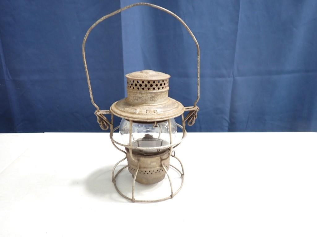 CNWRY Railroad Lantern: Very early CNWRY Railroad Lantern made by ADLAKE. Well marked. last patd. 1921. Embossed globe. has original burner and globe.