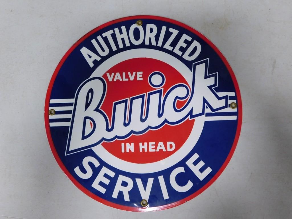 A Round Buick Enamel Sign Reading "Authorized Service Buick Valve in Head": A Round Buick Enamel Sign Reading "Authorized Service Buick Valve in Head" . Approx 12" in diameter