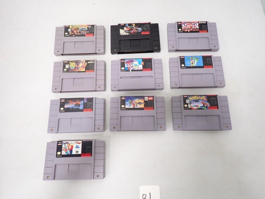 Super Nintendo Game Lot including Uniracel's, Super mario World, Dracula, Super Street Fighter II (1 of 18)