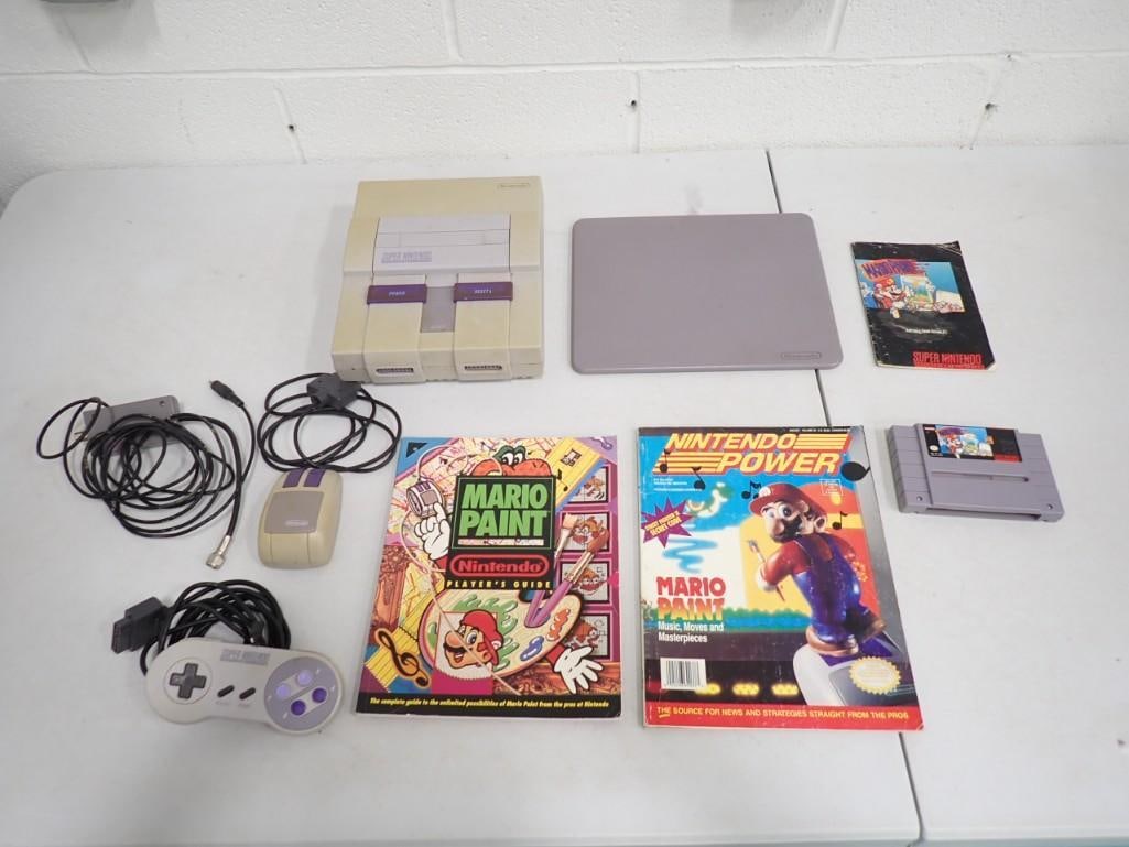 Super Nintendo Lot including System, Mouse, Mario Paint, Nintendo Power, RF Cord: Super Nintendo Lot including System, Mouse, Mario Paint, Nintendo Power, RF Cord. Untested.