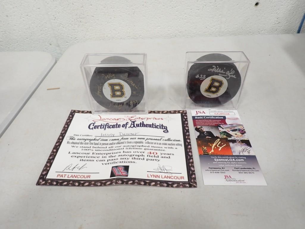 Willie O'Ree and Woody "Porky" Dumart Signed NHL Hockey Pucks with COAs including a JSA: Willie O'Ree and Woody "Porky" Dumart Signed NHL Hockey Pucks with COAs including a JSA