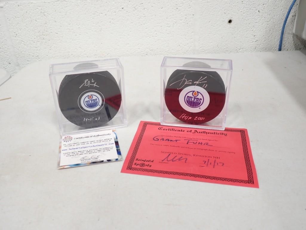 Grant Fuhr HOF 2003 and Jari Kurri HOF 2001 Signed NHL Hockey Pucks with COAs: Grant Fuhr HOF 2003 and Jari Kurri HOF 2001 Signed NHL Hockey Pucks with COAs