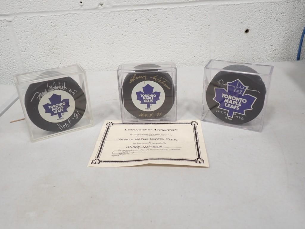 3 Signed NHL Hockey Pucks including Norm Ullman HOF 1982, Harry Watson HOF 1994, Frank Mahovlich HOF (1 of 7)
