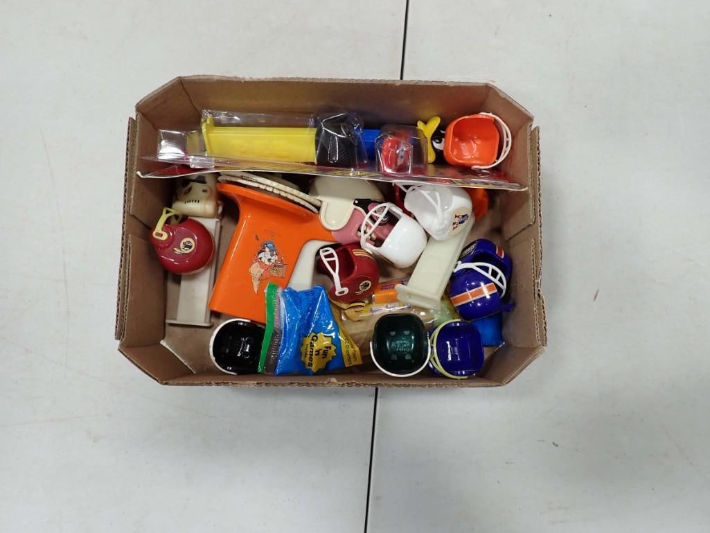 Smalls lot including Mini Football Helmets, Pez, Label Maker, etc.: Smalls lot including Mini Football Helmets, Pez, Avery Nutty Mads Hot Rod Speed Demon Unicycle Pistol Grip Label Maker, etc.