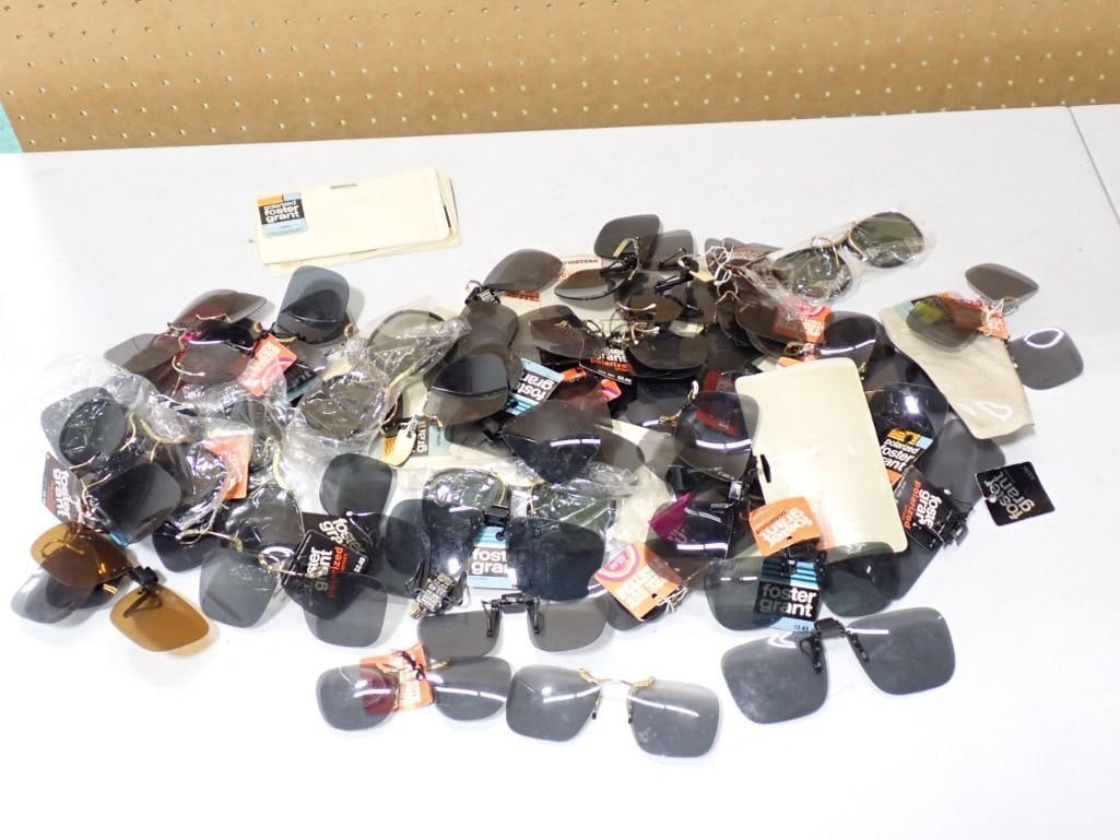 Large Lot of assorted Clip on Sunglasses: Large Lot of assorted Clip on Sunglasses including Foster Grant, Polarized, etc.