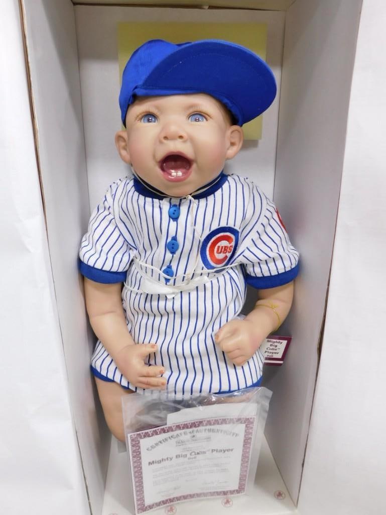 Ashton Drake Mighty Big Cubs Player Doll New in Box with COA: Ashton Drake Galleries So Truly Real Mighty Big Cubs Player 23" Doll New in Box with COA . Vinyl and cloth weighted baby doll by Bonnie Chyle.