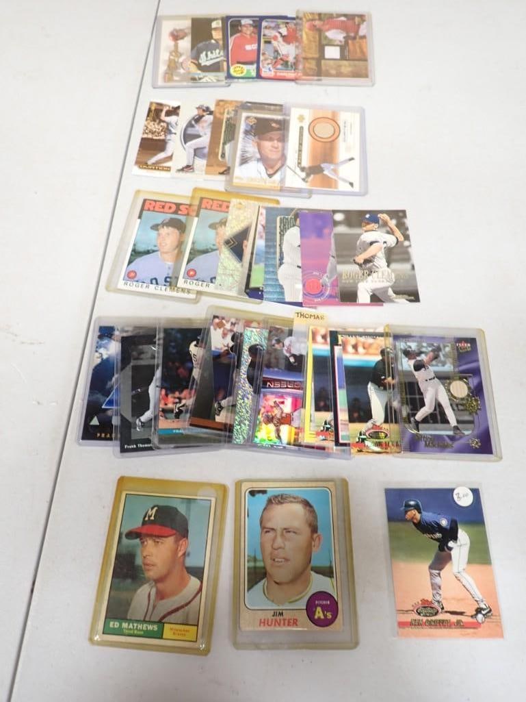 Lot of assorted Baseball Cards including Jim Hunter, Ed Mathews, Ken Griffey Jr., Frank Thomas, Roge (1 of 8)